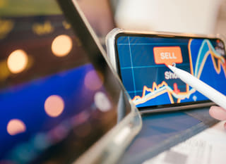 Trader across multiple markets analyzing Bitcoin, Ethereum, and forex options
