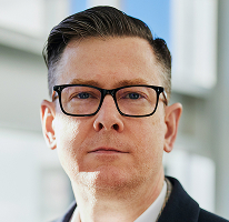 Alexander Hughes portrait, crypto trading company CEO and executive